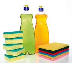 Cleaning products including sponges and bottles of detergent Cleaning products including sponges and bottles of detergent